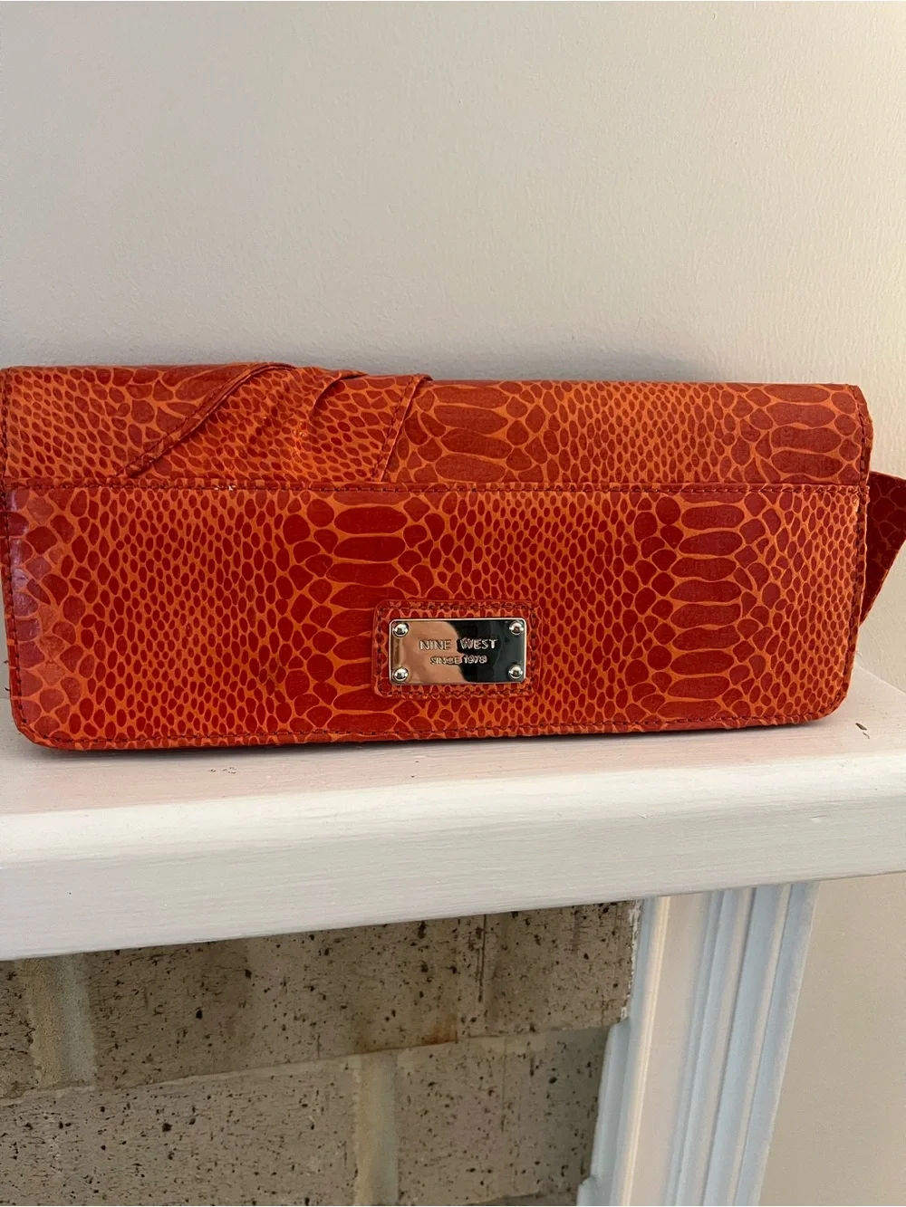 Nine West Orange Textured Bow Clutch